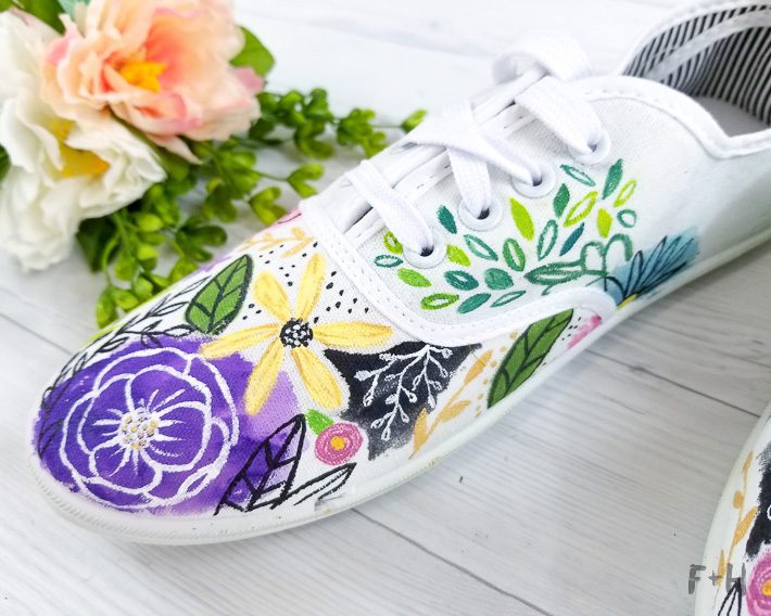 painting flowers on shoes