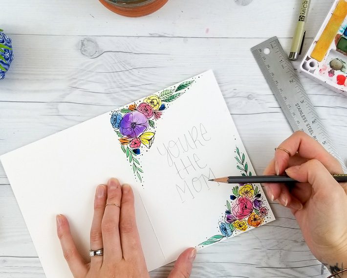 hand lettering with watercolor flowers