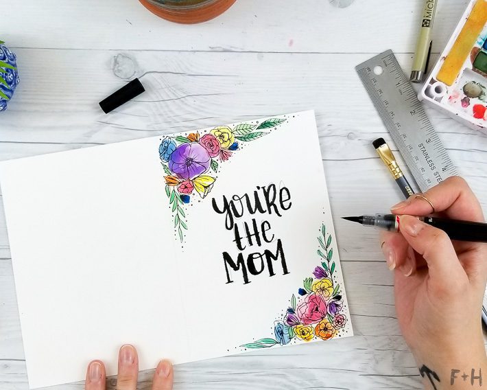 hand lettering with watercolor flowers