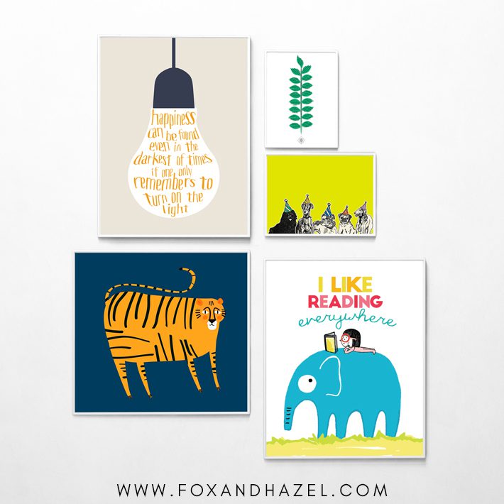 gallery wall of colorful printable wall art for kids in white frames