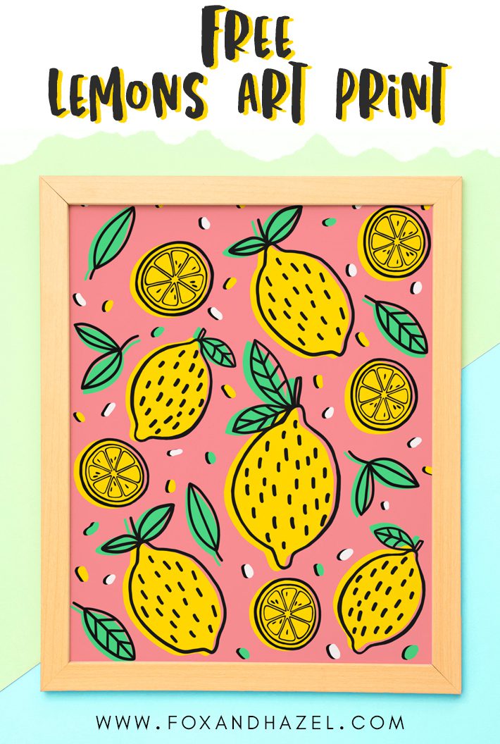 art print of lemons on pink ground, inside a wood frame on a green and blue background