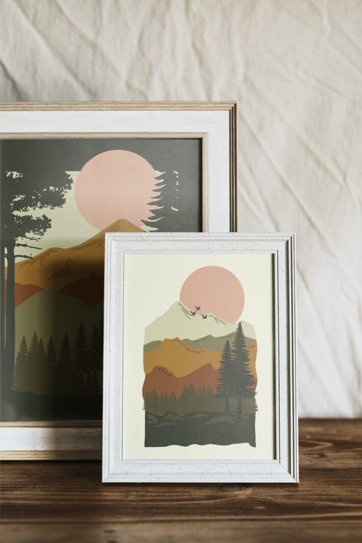 A set of three free forest landscape printable art prints featuring pine trees, mountains, and warm earthy tones